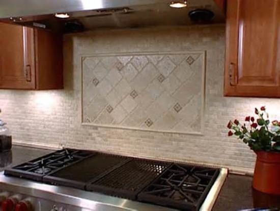 Kitchen - transitional kitchen idea in Austin with beaded inset cabinets, medium tone wood cabinets, beige backsplash and stainless steel appliances