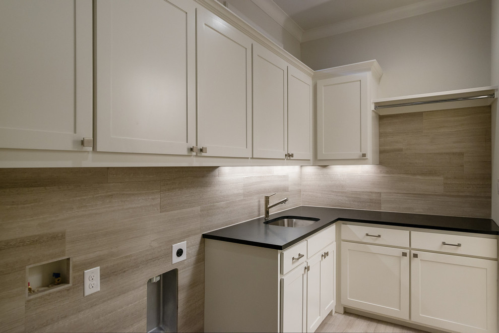 Inspiration for a transitional laundry room remodel in Dallas