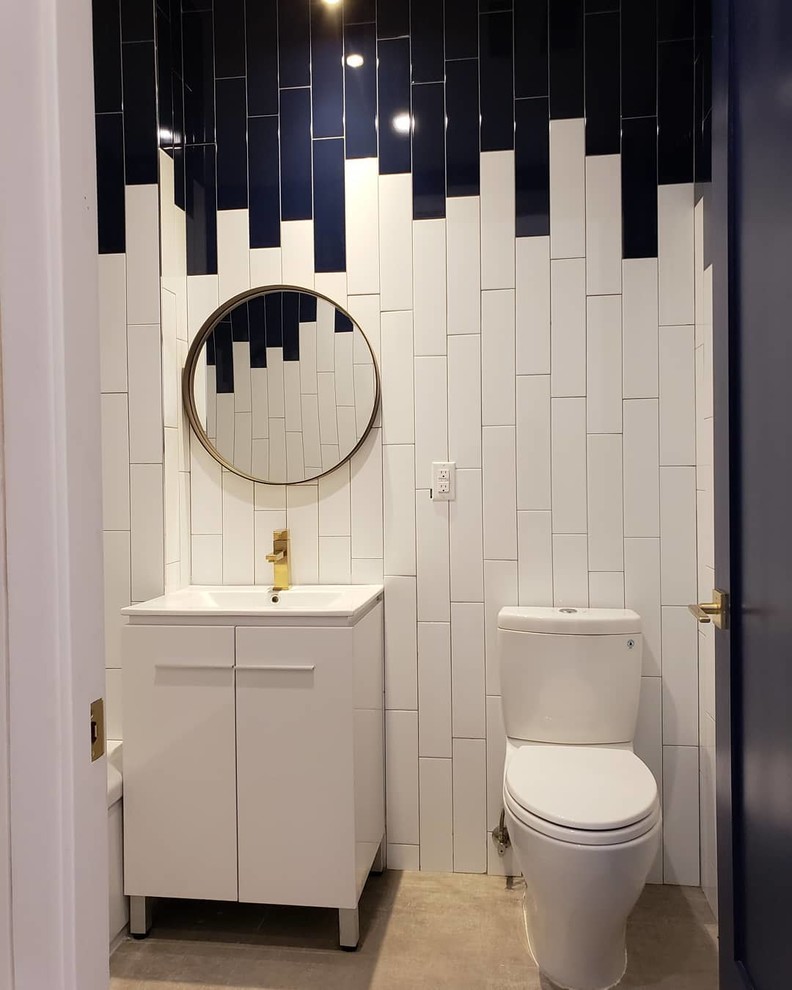 Mid-sized contemporary master bathroom in New York with beaded inset cabinets, white cabinets, a drop-in tub, a shower/bathtub combo, a two-piece toilet, black and white tile, ceramic tile, multi-coloured walls, cement tiles, an integrated sink, engineered quartz benchtops, beige floor, an open shower and white benchtops.