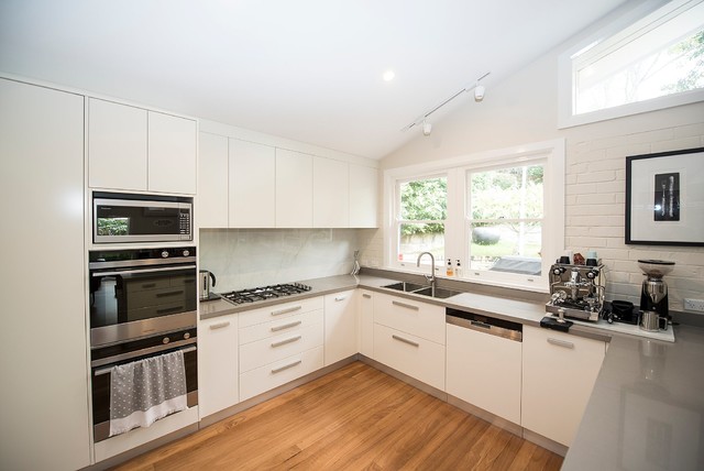 Contempory Kitchen with Urban Ceasarstone Benchtops contemporary-koek