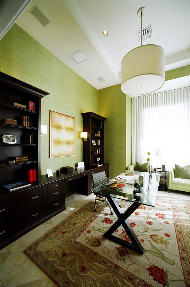 Photo of a transitional home office in Miami.