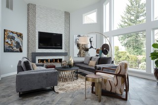 ミッドセンチュリースタイルのおしゃれなリビング (グレーの床) の