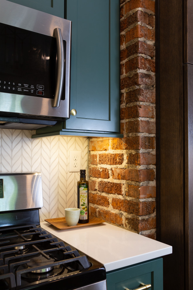 Kitchen - kitchen idea with shaker cabinets, green cabinets, quartz countertops, white backsplash, marble backsplash, stainless steel appliances, no island and white countertops