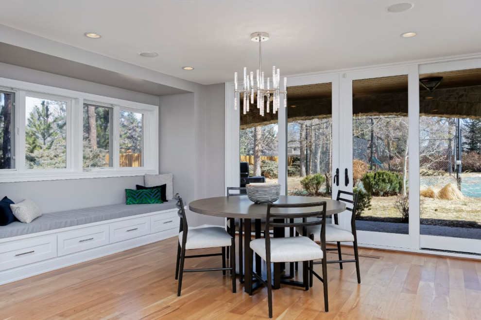 Mid-sized contemporary open plan dining in Denver with grey walls, medium hardwood floors and no fireplace.