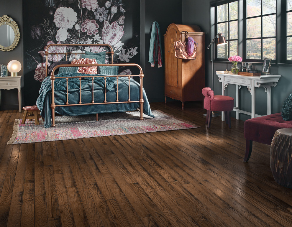 Mid-sized transitional guest dark wood floor and brown floor bedroom photo in Los Angeles with gray walls and no fireplace