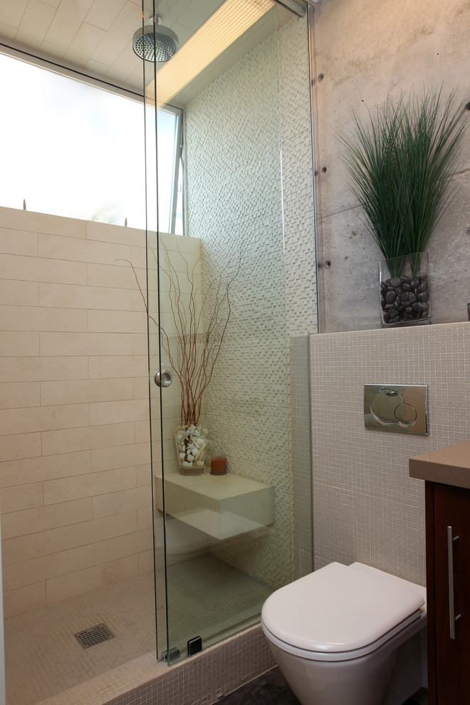 Large modern master bathroom in Los Angeles with flat-panel cabinets, dark wood cabinets, a freestanding tub, a curbless shower, grey walls, concrete floors, a vessel sink, grey floor, beige tile, mosaic tile, engineered quartz benchtops and a sliding shower screen.