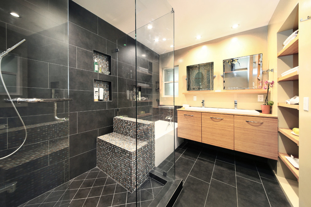 Large contemporary master bathroom in Los Angeles with a vessel sink, flat-panel cabinets, gray tile, mosaic tile, ceramic floors, medium wood cabinets, wood benchtops, a double shower and a two-piece toilet.