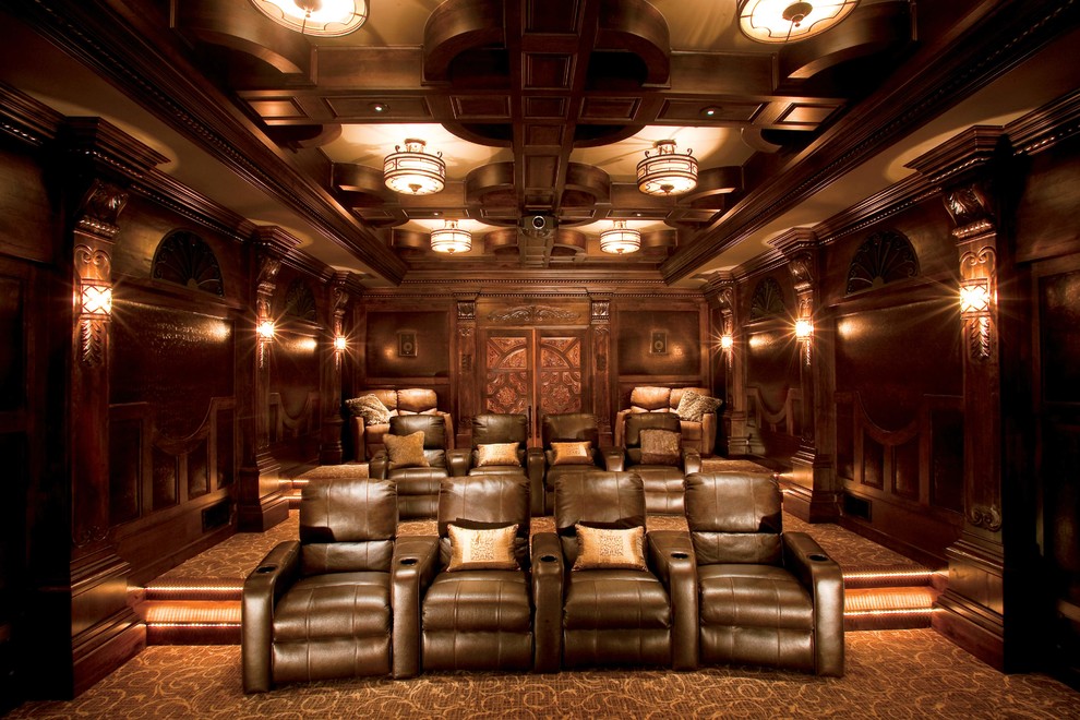 Large modern enclosed home theatre in Atlanta with brown walls, carpet and multi-coloured floor.