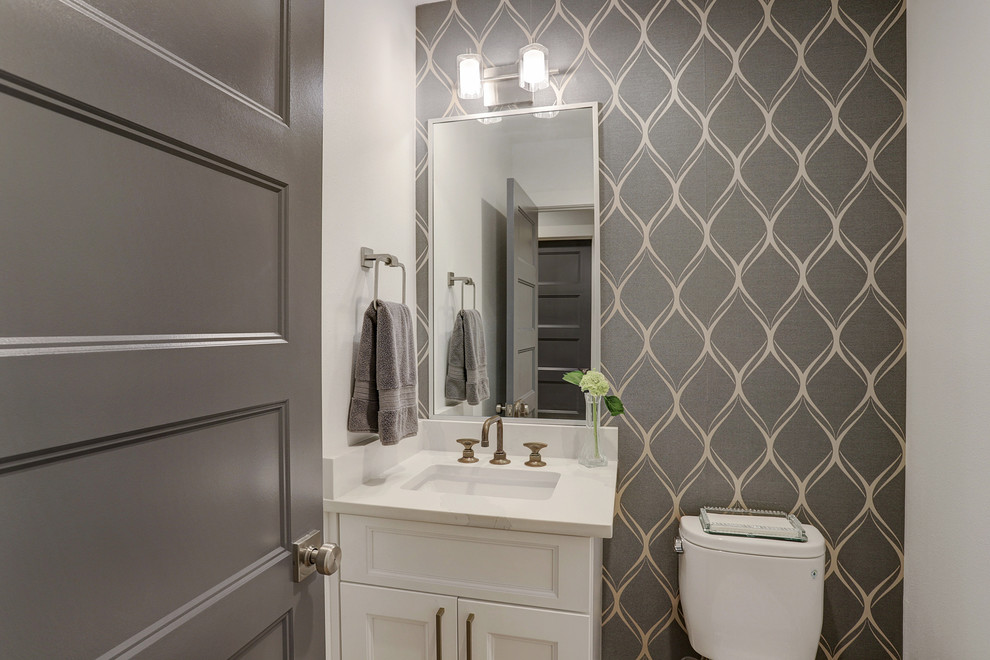 Example of a small transitional 3/4 light wood floor and beige floor bathroom design in Houston with recessed-panel cabinets, white cabinets, a one-piece toilet, white walls, an undermount sink, quartz countertops and white countertops