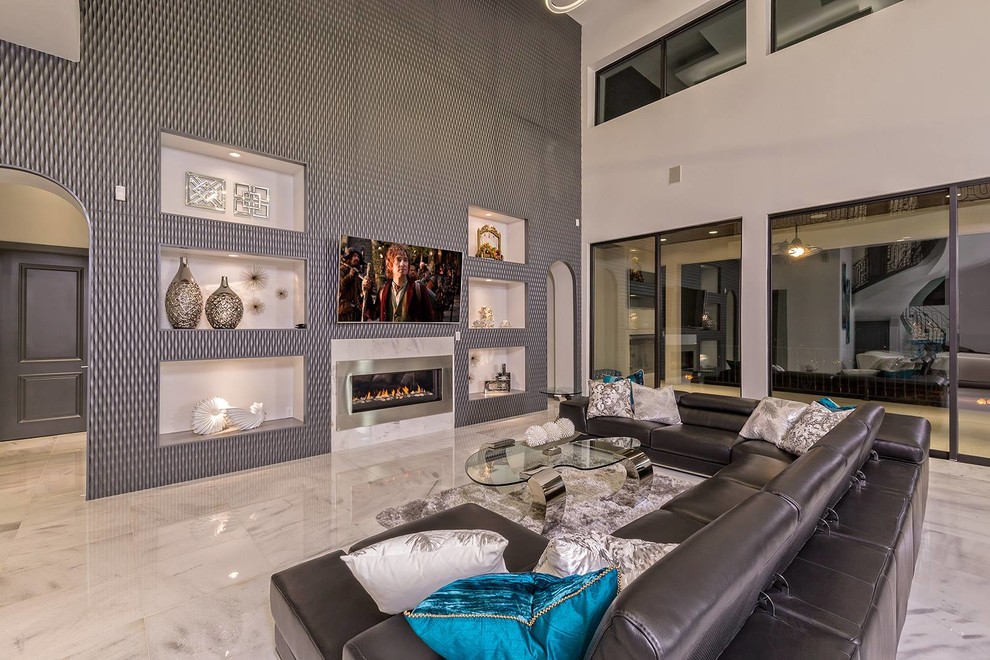 Photo of an expansive contemporary open concept living room in Austin with grey walls, marble floors, a ribbon fireplace, a metal fireplace surround and a wall-mounted tv.