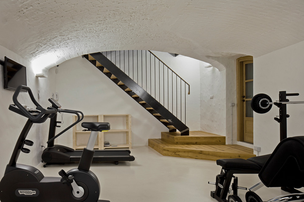Design ideas for an industrial home gym in Milan.