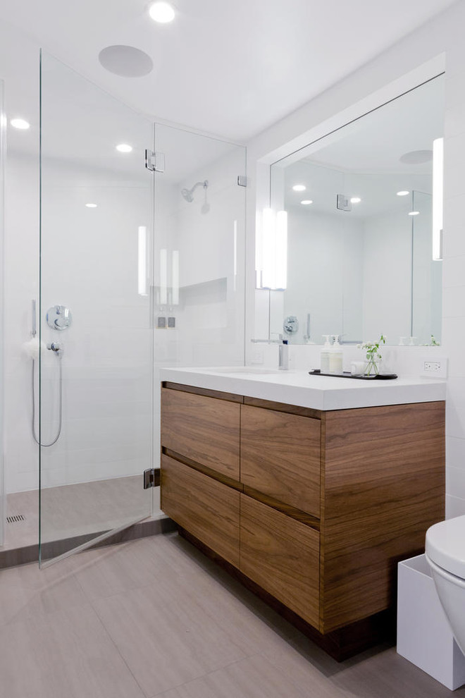 Large scandinavian master bathroom in Los Angeles with an alcove shower, white walls and a hinged shower door.