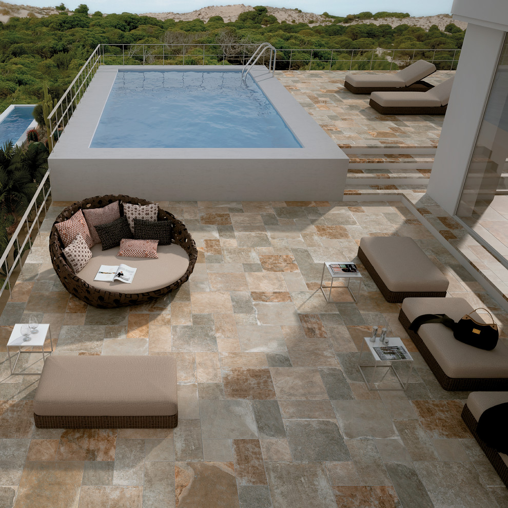 Example of a mid-sized transitional rooftop tile and rectangular aboveground pool design in Denver