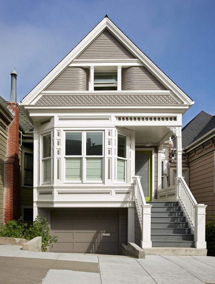 This is an example of a traditional two-storey beige exterior in San Francisco with a gable roof.