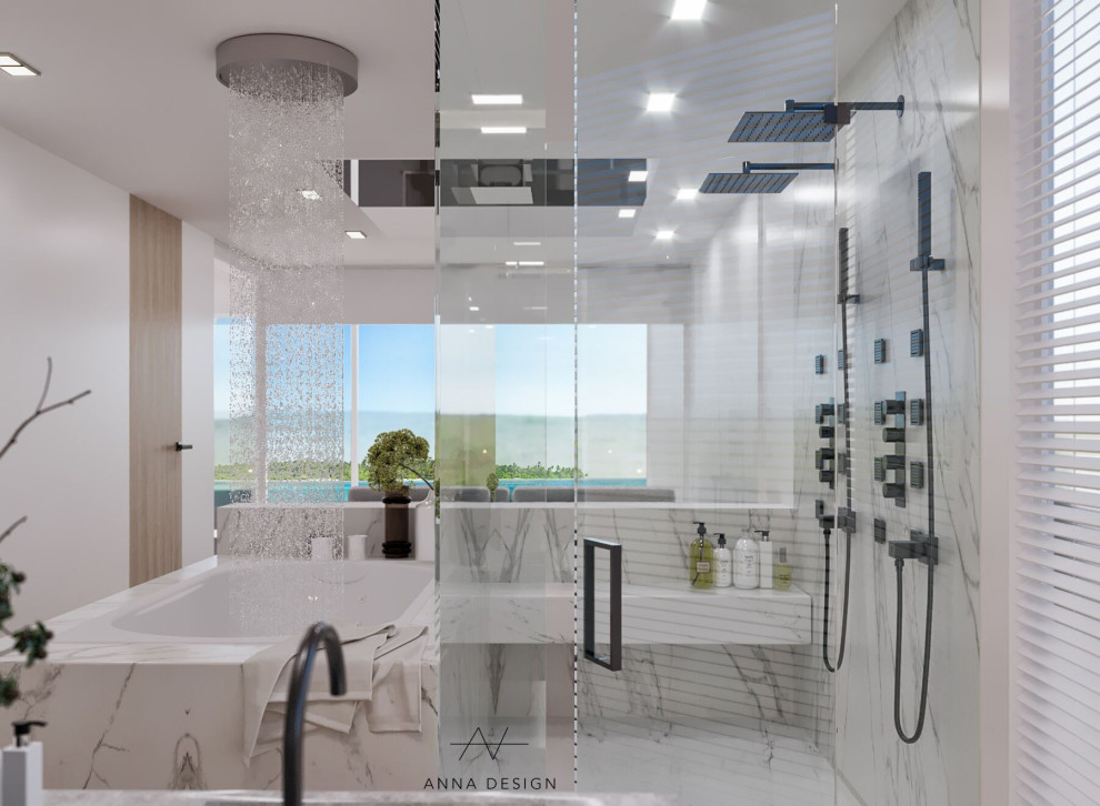 Design ideas for a mid-sized modern master bathroom in Los Angeles with flat-panel cabinets, grey cabinets, a drop-in tub, a double shower, a wall-mount toilet, white tile, stone slab, white walls, light hardwood floors, an integrated sink, engineered quartz benchtops, grey floor, a hinged shower door, grey benchtops, a shower seat, a double vanity, a floating vanity and panelled walls.