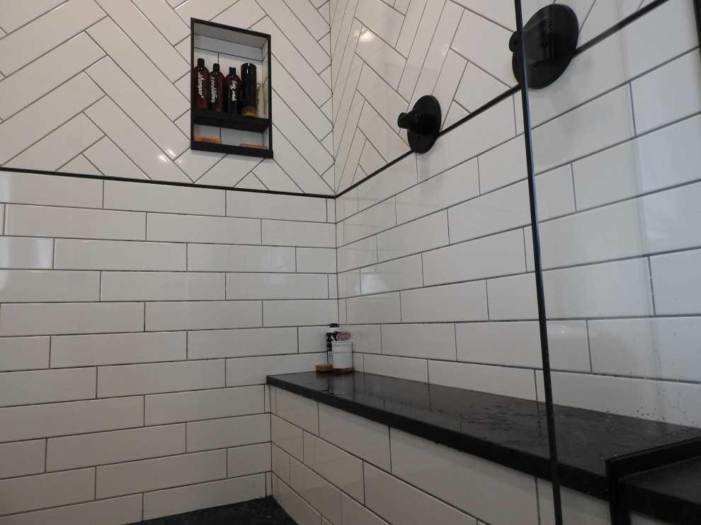 Example of a transitional home design design in Denver
