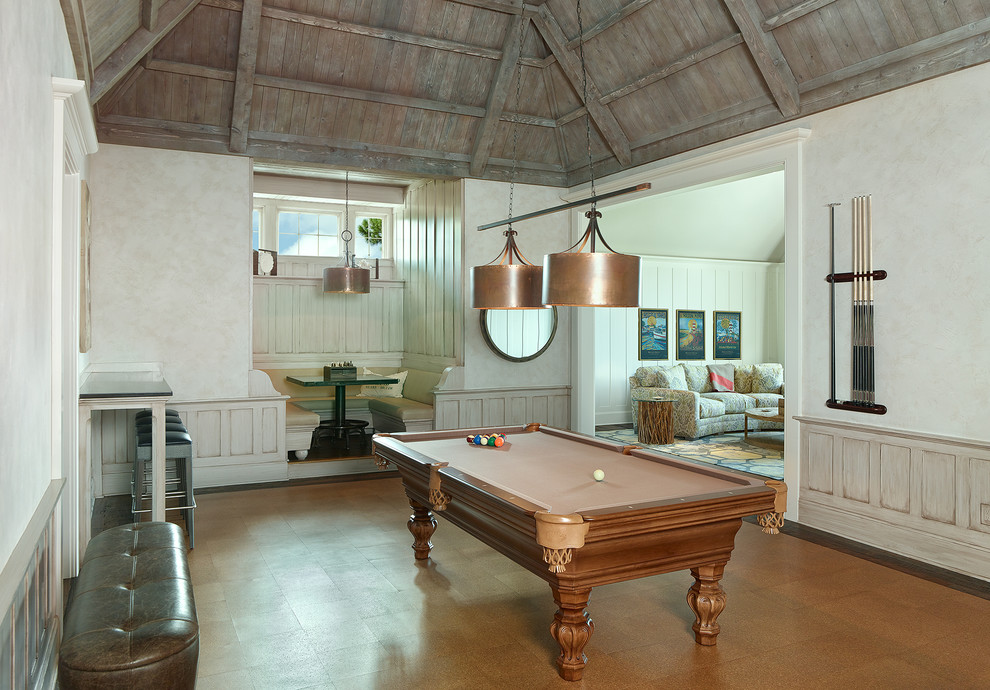 Beach style family room in Other with a game room, beige walls and brown floor.