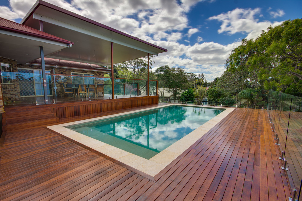 Inspiration for a large transitional backyard pool in Gold Coast - Tweed.