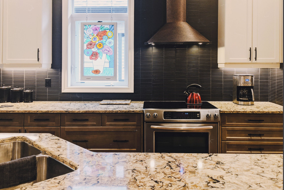 Example of a transitional kitchen design in Toronto