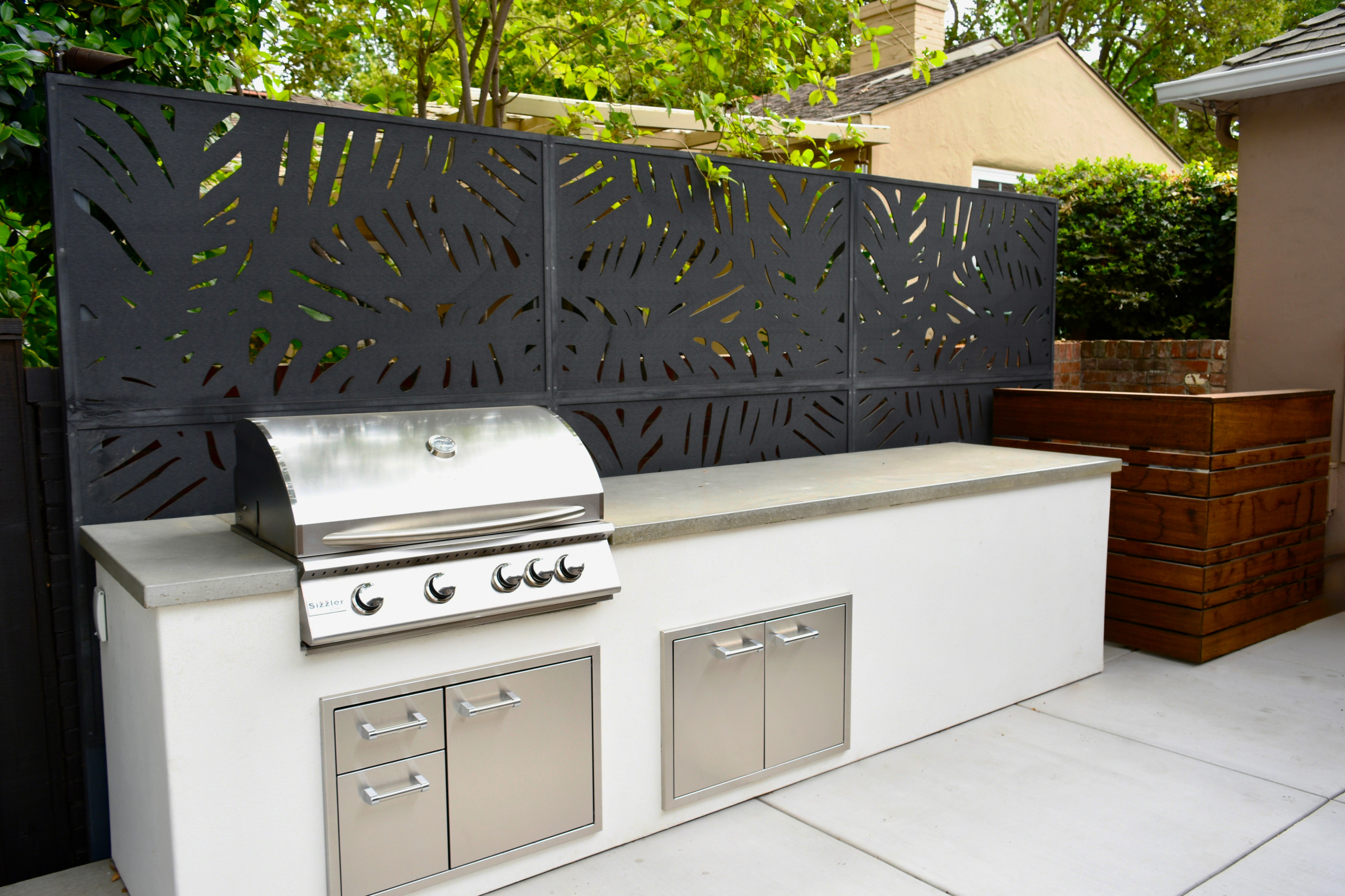 Modern Outdoor Kitchen with Custom Privacy Screens