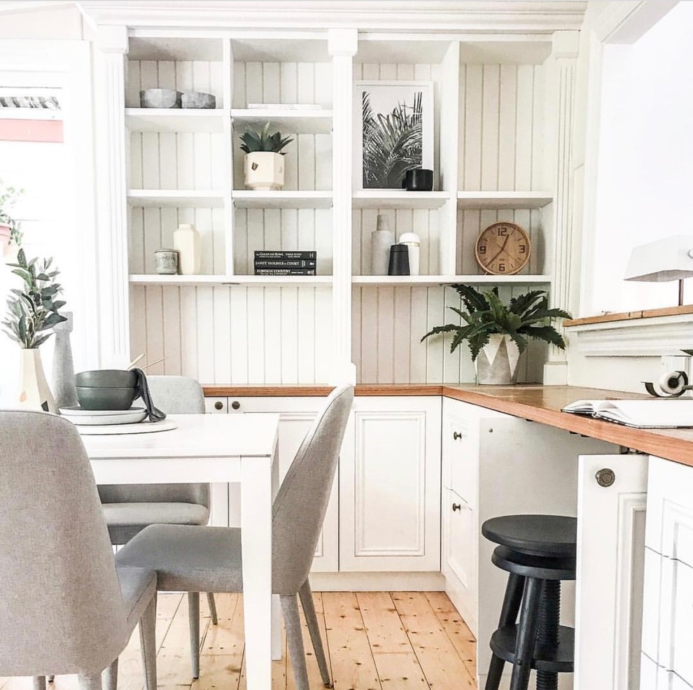 This is an example of a small transitional home design in Sydney.