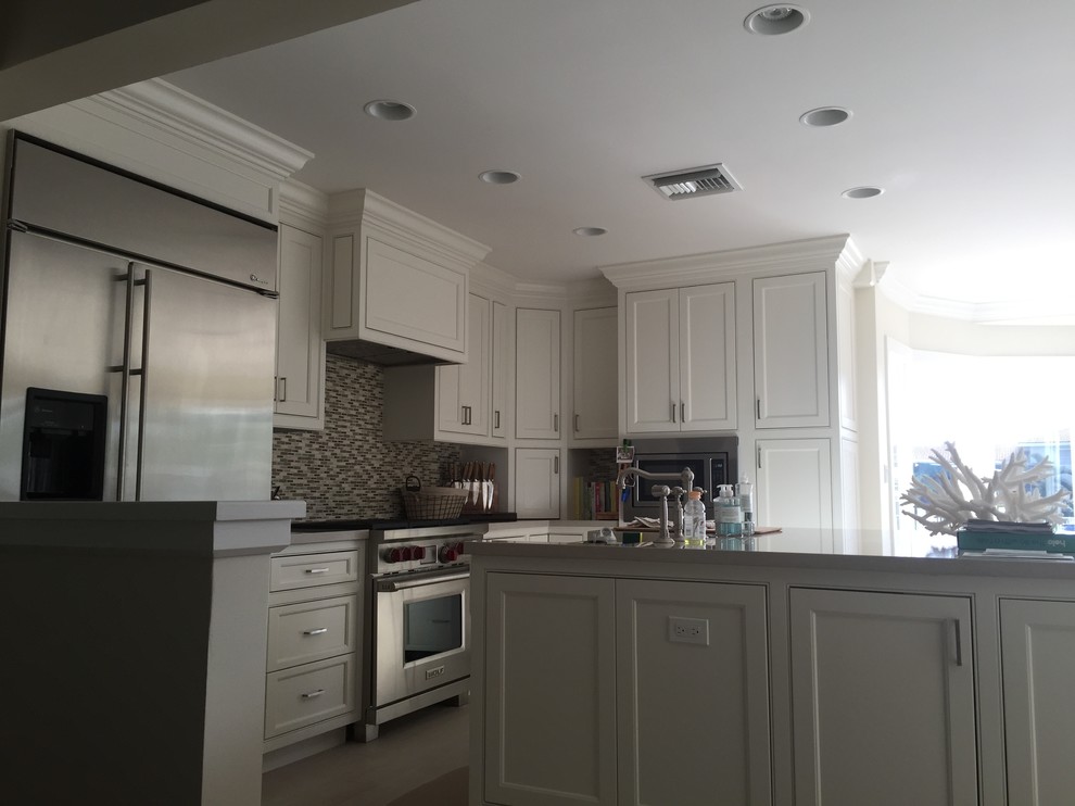 Example of a transitional kitchen design in Miami