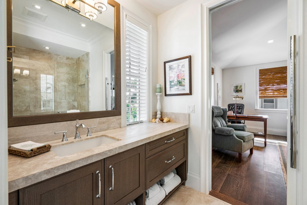 Large beach style marble floor, single-sink, coffered ceiling and wood wall bathroom photo in Miami with shaker cabinets, medium tone wood cabinets, an undermount sink, quartzite countertops, a hinged shower door, multicolored countertops and a built-in vanity