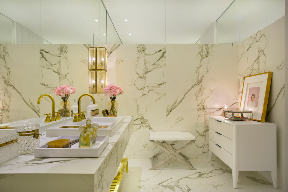 Traditional bathroom in Other with white cabinets, white tile, marble, white walls, marble floors, white floor and flat-panel cabinets.