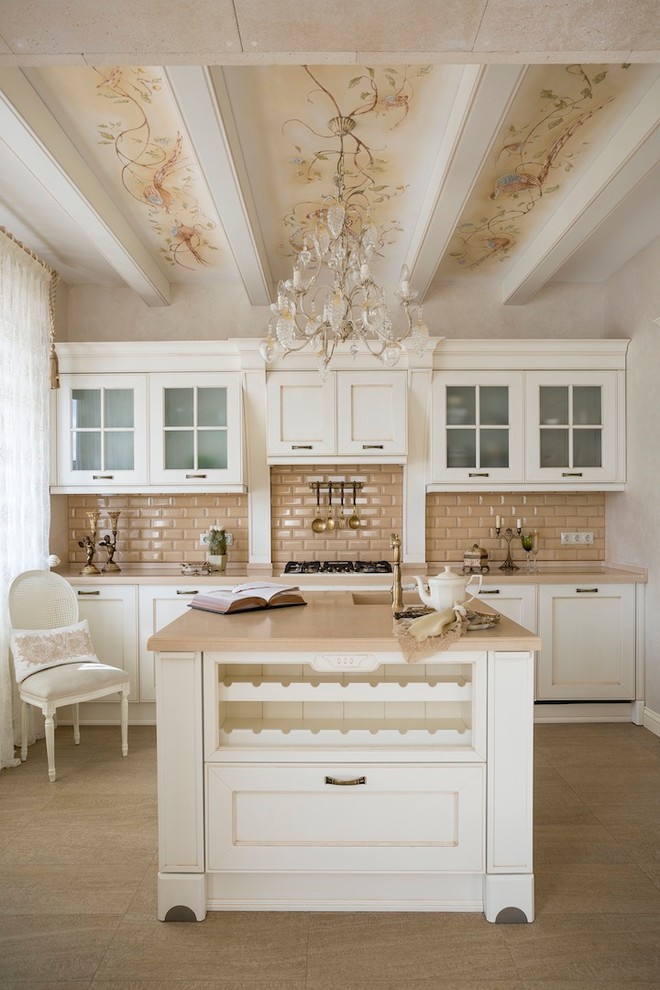 Traditional single-wall kitchen in Moscow with recessed-panel cabinets, white cabinets, beige splashback, subway tile splashback and with island.