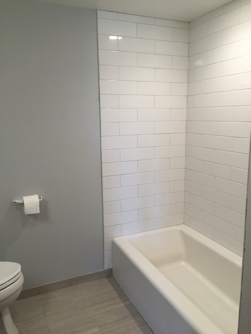 subway tile for Kohler Villager - Here are two photos of our newly finished surround! Tub : Kohler Villager , Tile: American Olean Ice White ,Grout: Color is Silverado ,Fixtures: Delta  Ashlyn