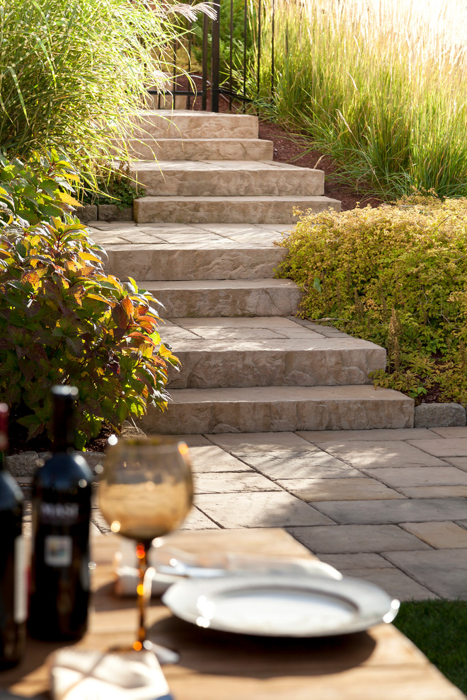 Photo of a mid-sized rustic backyard landscaping.