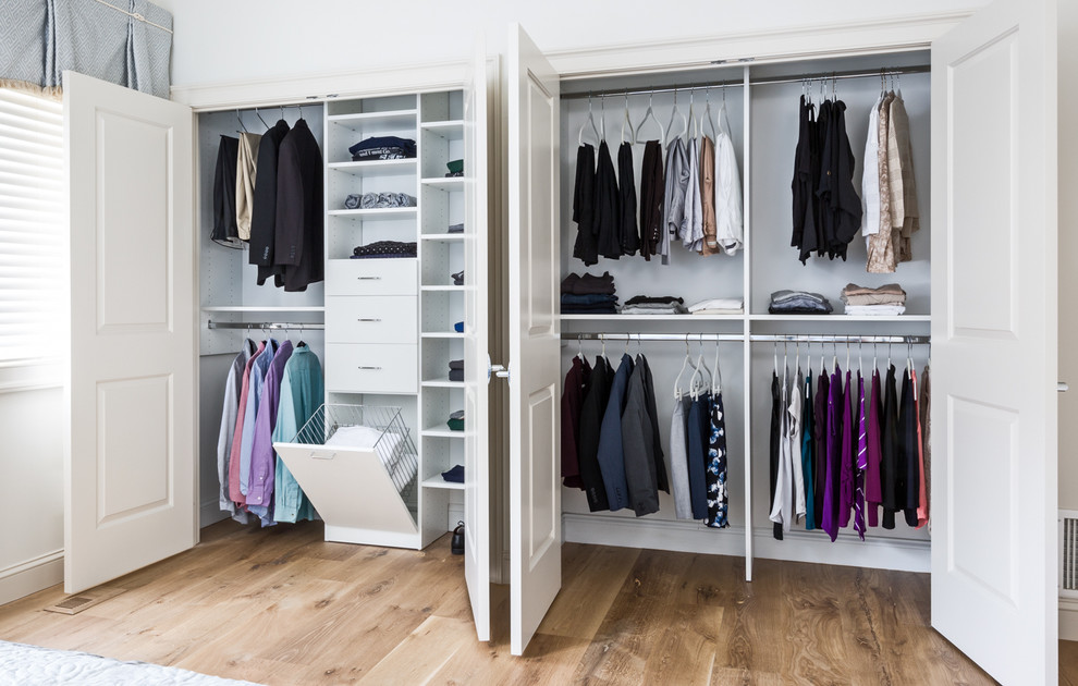 Photo of a large contemporary gender-neutral built-in wardrobe in New York.