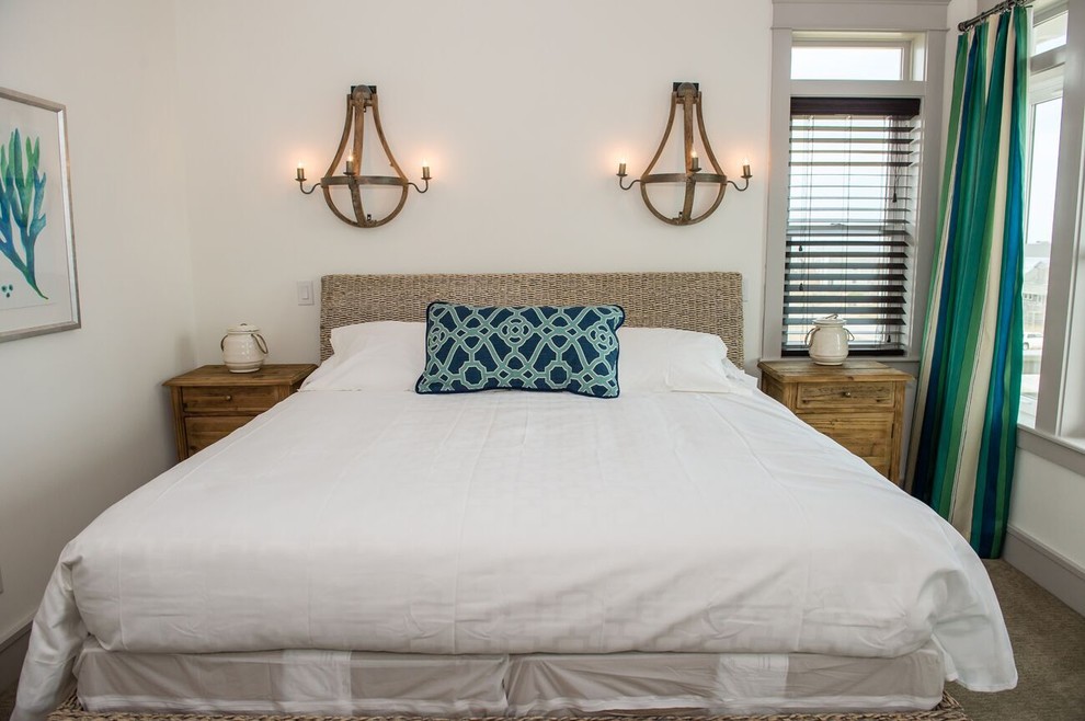 Example of a mid-sized transitional guest carpeted bedroom design with white walls and no fireplace