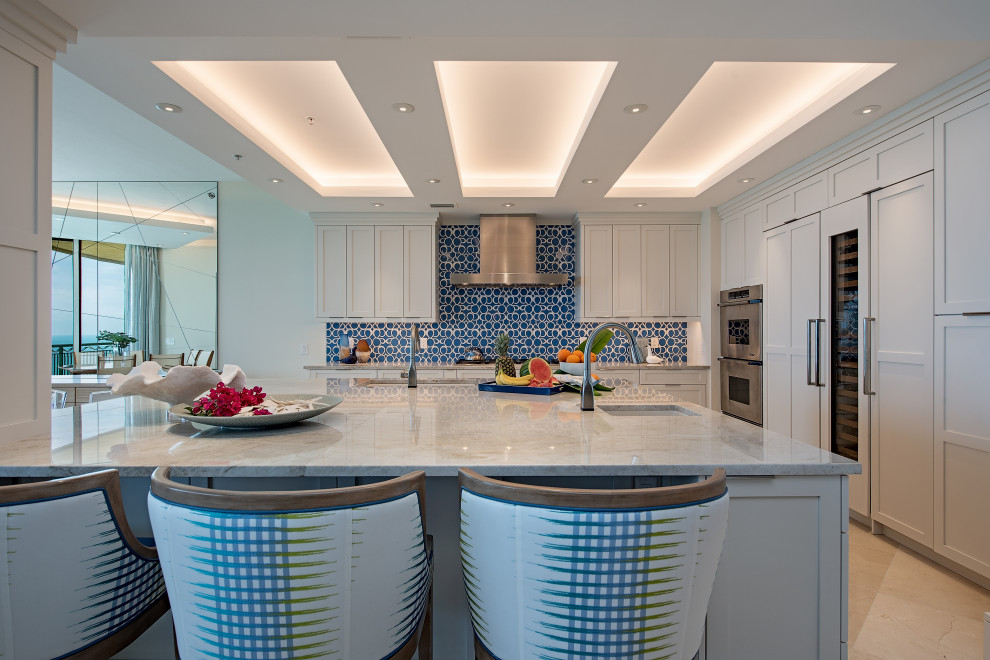 Island style kitchen photo in Miami