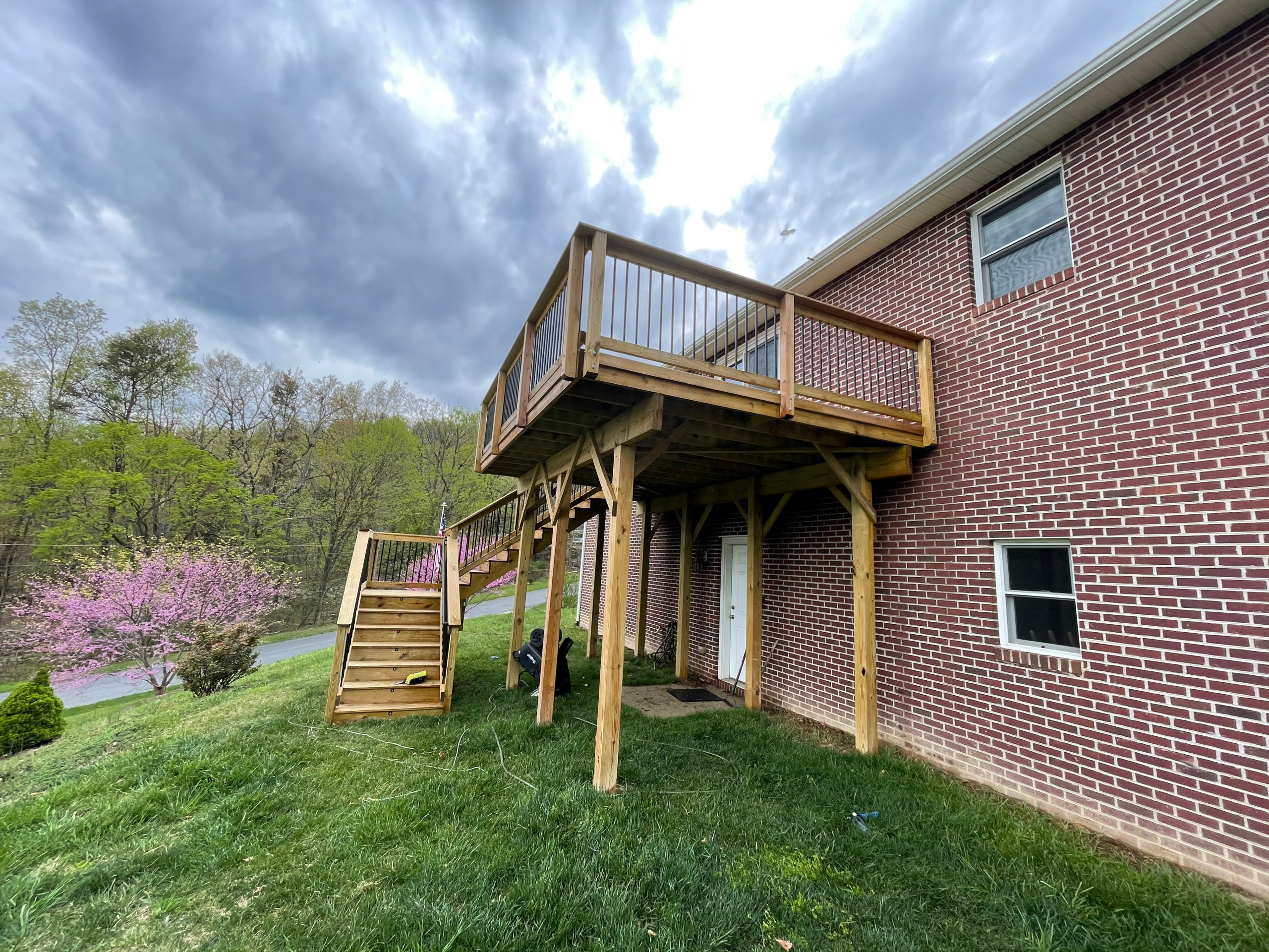 Deck stain and gutters powerwash