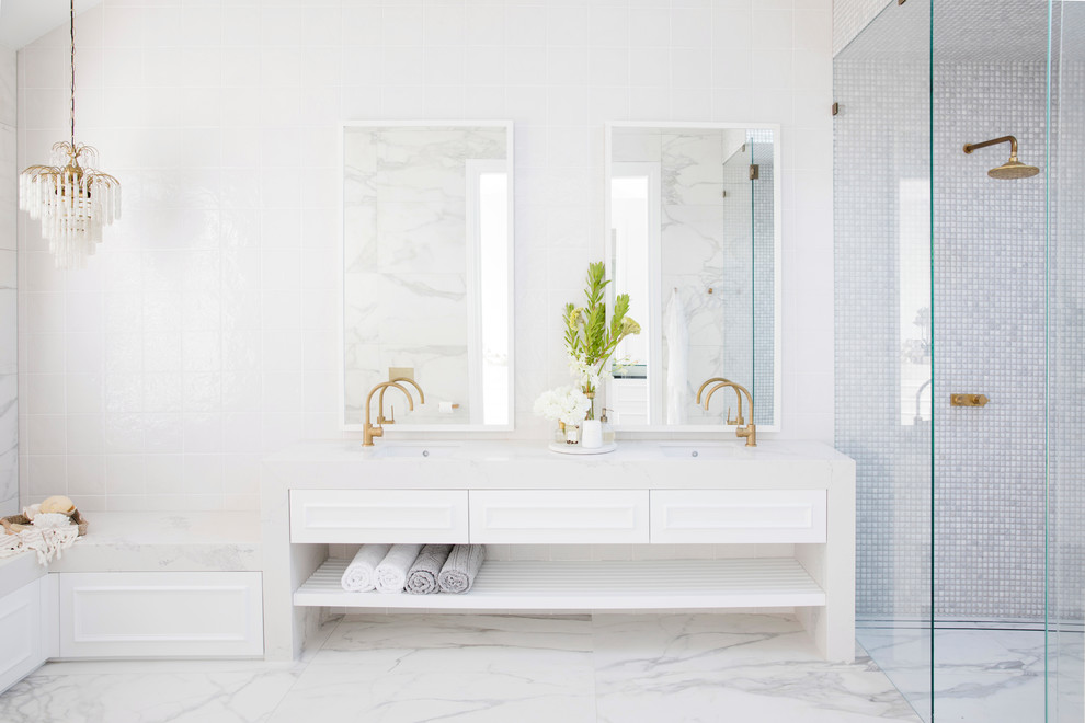 This is an example of a large beach style bathroom in Sydney with white cabinets, grey floor, a corner shower, gray tile, white tile, mosaic tile, white walls, an undermount sink, an open shower, grey benchtops and recessed-panel cabinets.