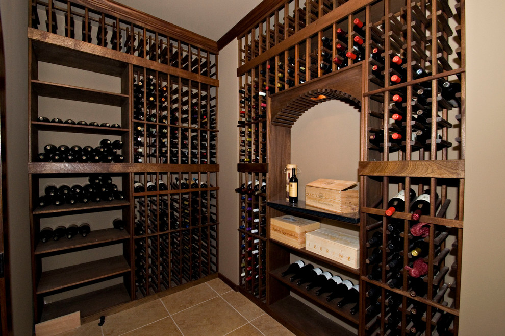 Photo of a mid-sized traditional wine cellar in Atlanta with ceramic floors and storage racks.