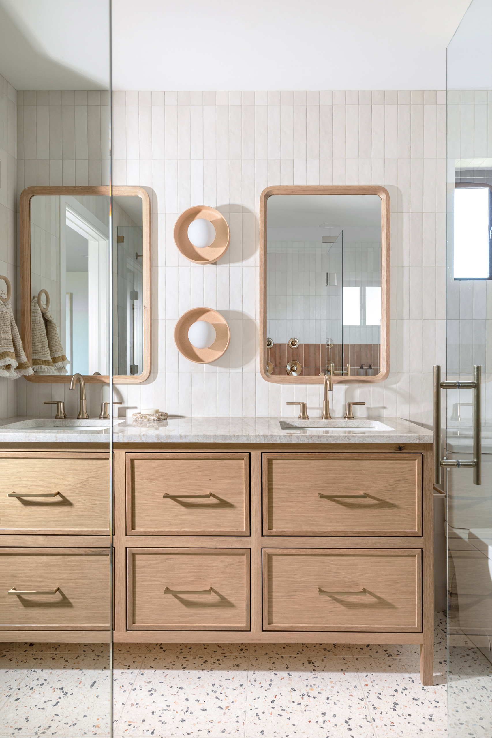 8 Stylish New Bathrooms With Wood Vanities, image size:1706x2560