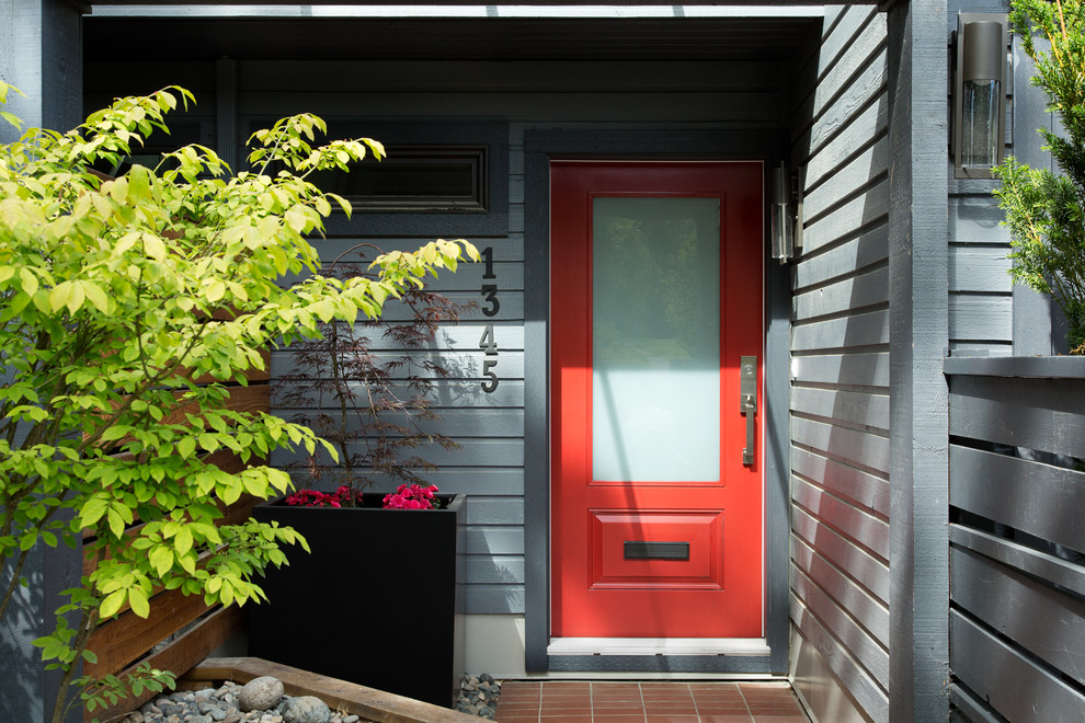Mid-sized transitional front door photo in Vancouver with a red front door