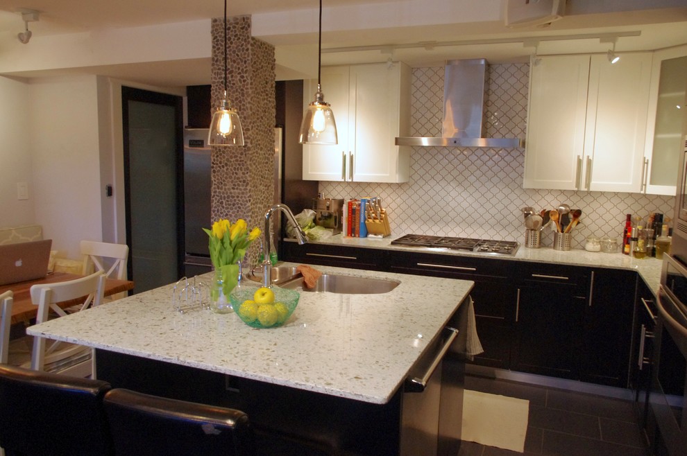 Example of a transitional kitchen design in Vancouver