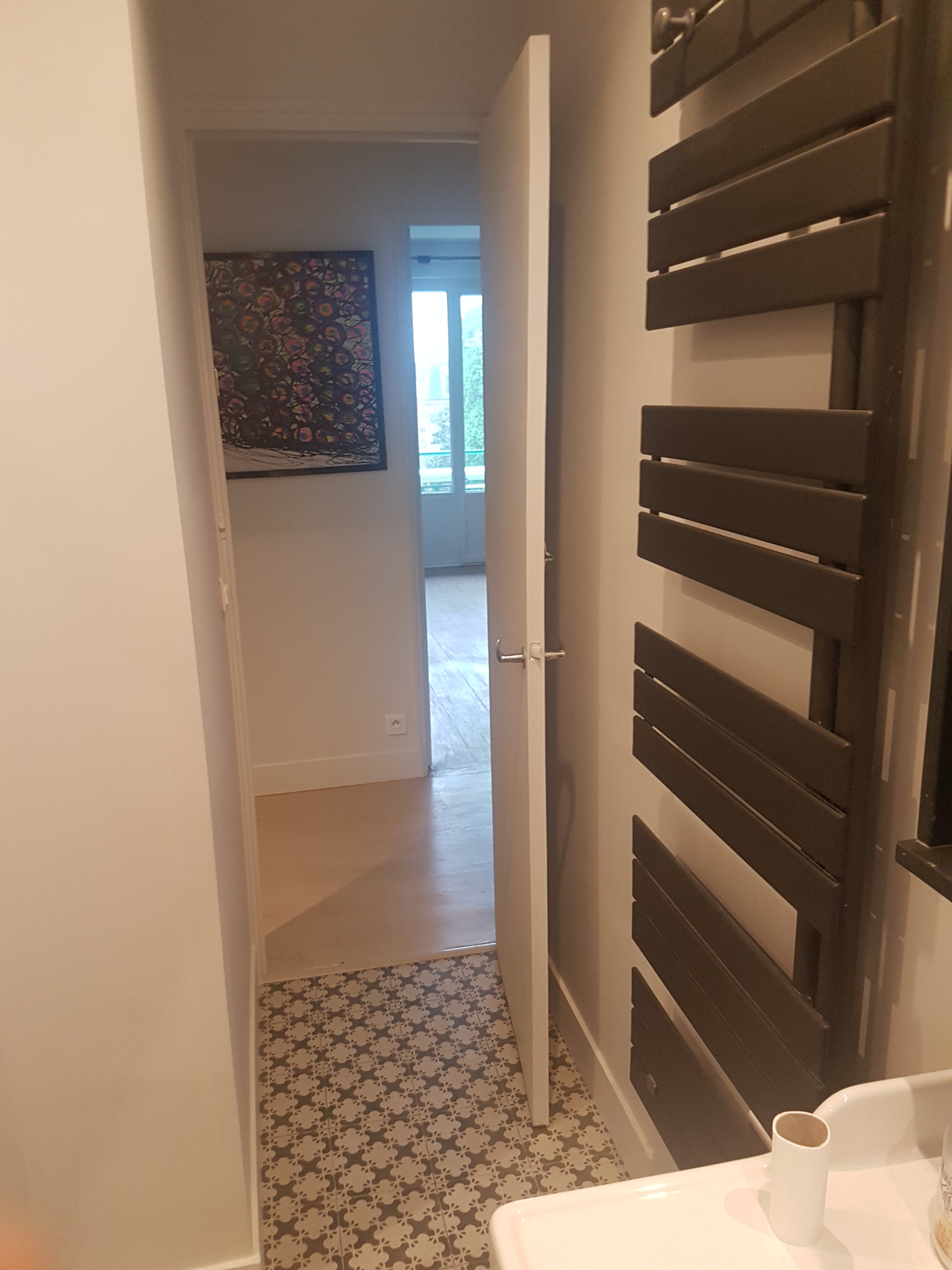 Appartement refondu suite à l'ajout d'un espace voisin