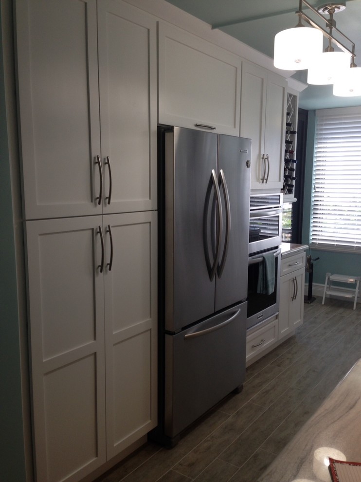 Transitional kitchen photo in Burlington