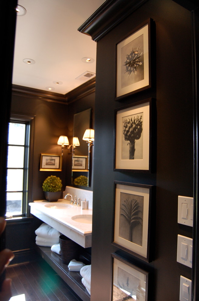 This is an example of a large transitional master bathroom in Chicago with open cabinets, dark wood cabinets, gray tile, white tile, dark hardwood floors, an undermount sink, engineered quartz benchtops, a two-piece toilet and black walls.