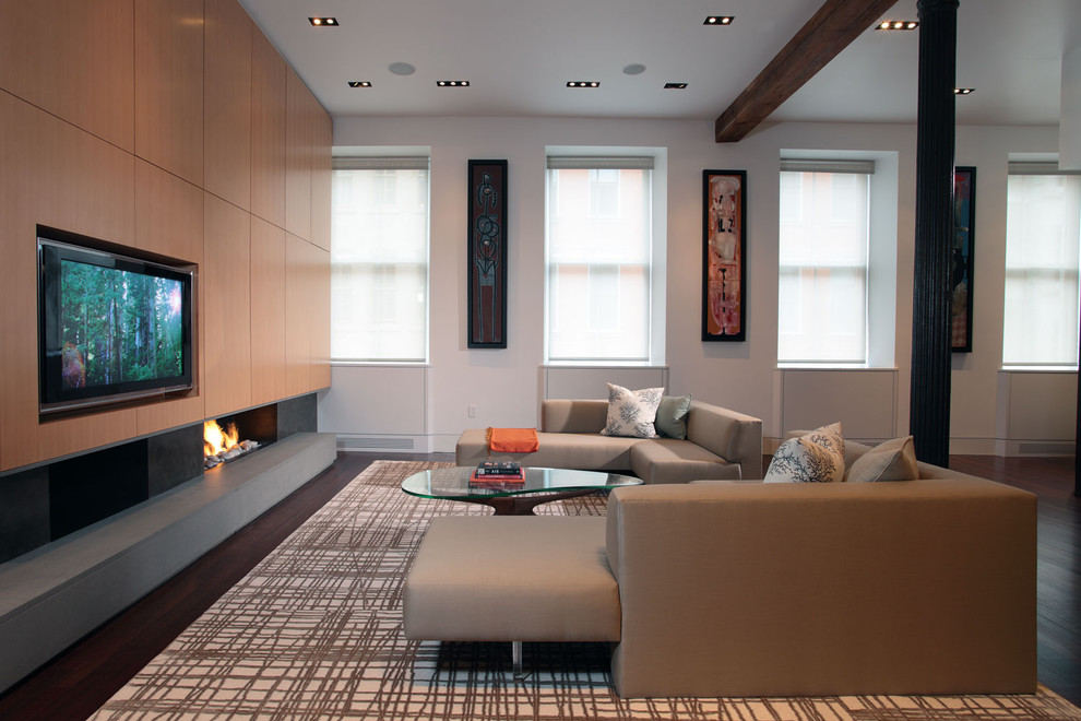 Contemporary open concept living room in New York with a ribbon fireplace and a built-in media wall.