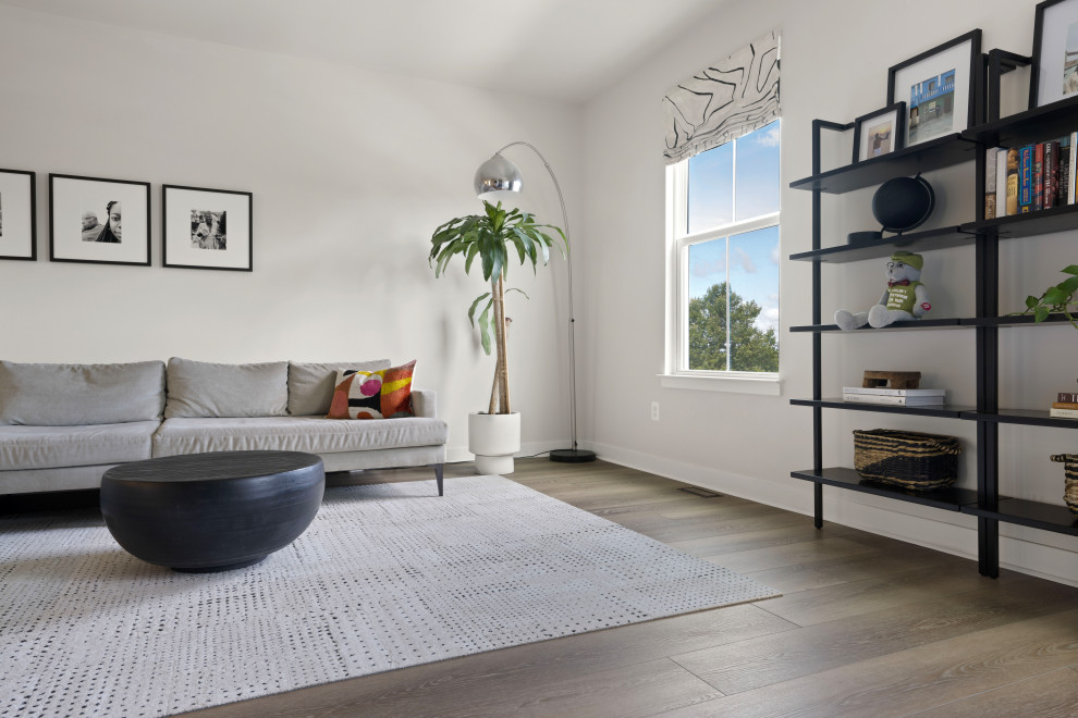 Foto på ett mellanstort minimalistiskt allrum med öppen planlösning, med ett finrum, vita väggar, vinylgolv och beiget golv