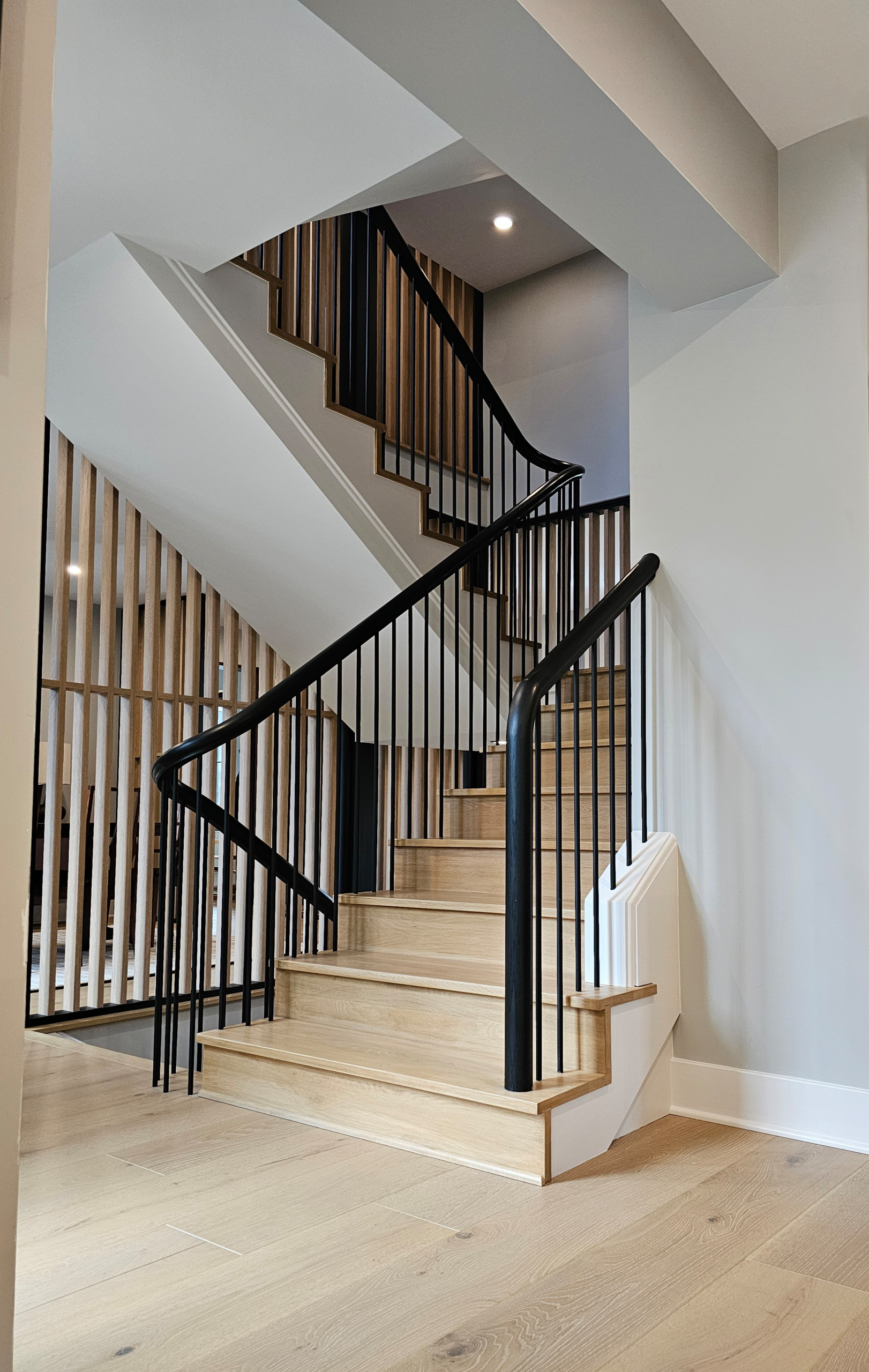 115_Stunning Continuous Rail System on 3 Story Floating Stairs; Arlington, VA 22