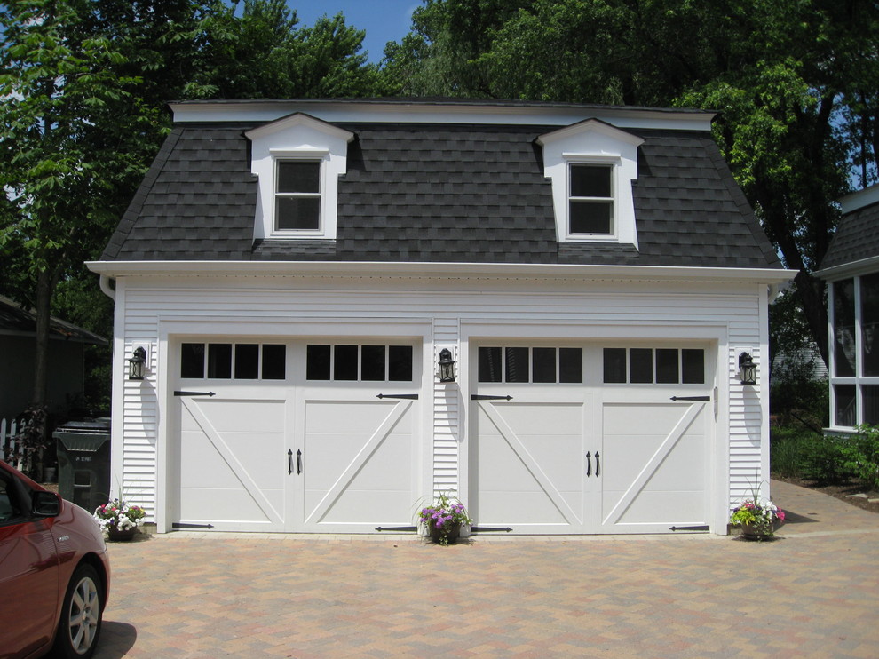 Design ideas for an arts and crafts detached two-car garage in Chicago.
