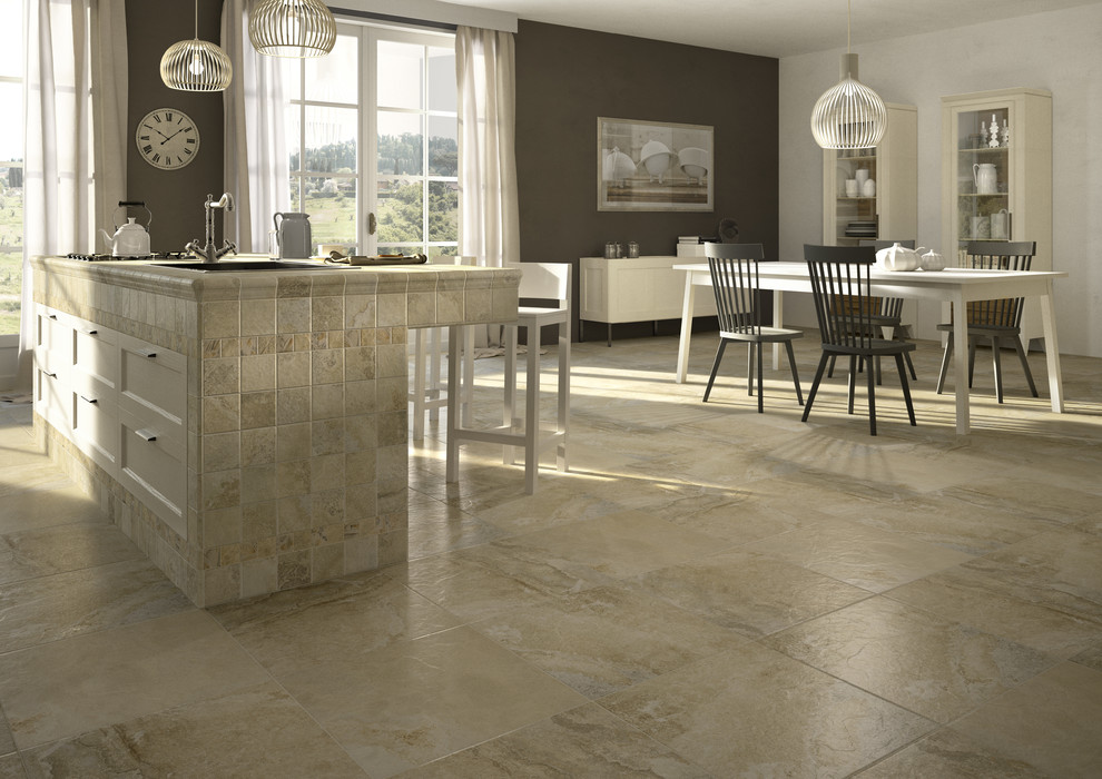 Inspiration for a large transitional porcelain tile eat-in kitchen remodel in Denver with an undermount sink, shaker cabinets, white cabinets, tile countertops and an island