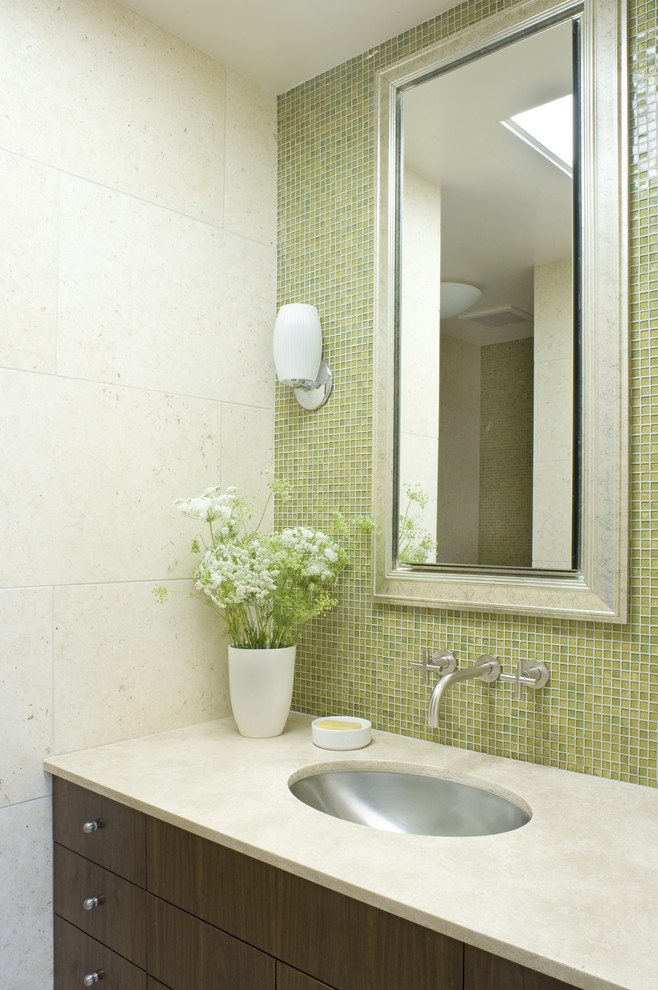 Contemporary bathroom in San Francisco with mosaic tile, an undermount sink and green walls.
