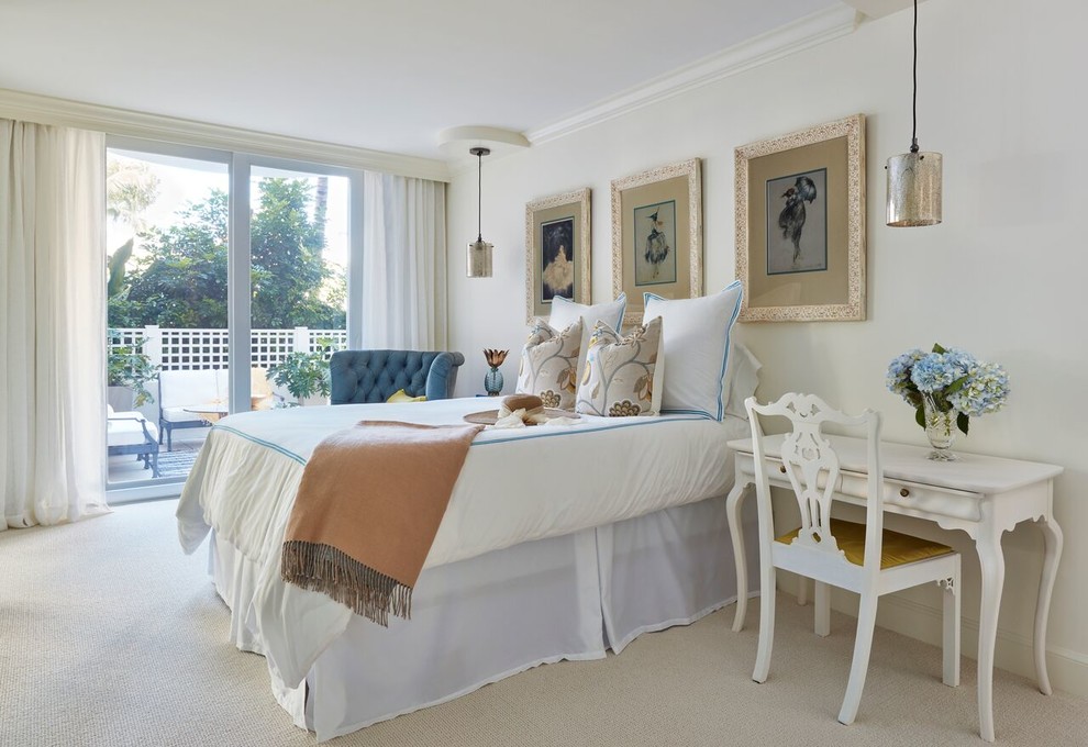 Inspiration for a mid-sized beach style master bedroom in Miami with white walls, carpet and white floor.